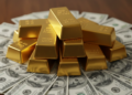 Златото и среброто опаднаа по рекордниот раст, додека доларот бележи раст